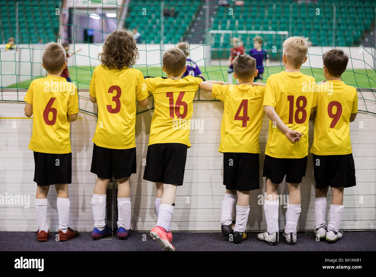 Young boys of soccer youth team. Football tournament match for kids