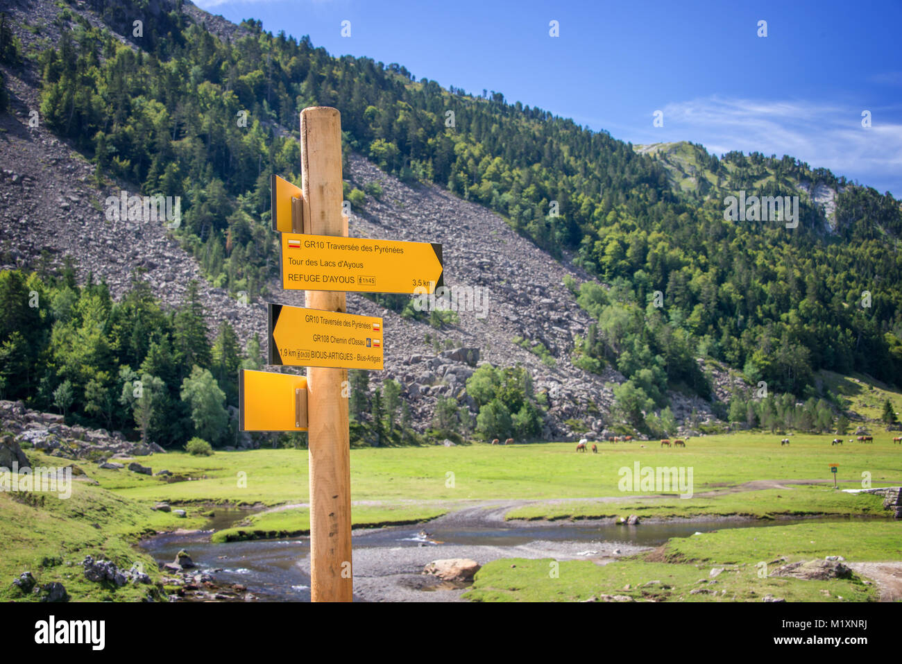 Hiking direction sign in Ossau Valley, Pyrenees, France Stock Photo