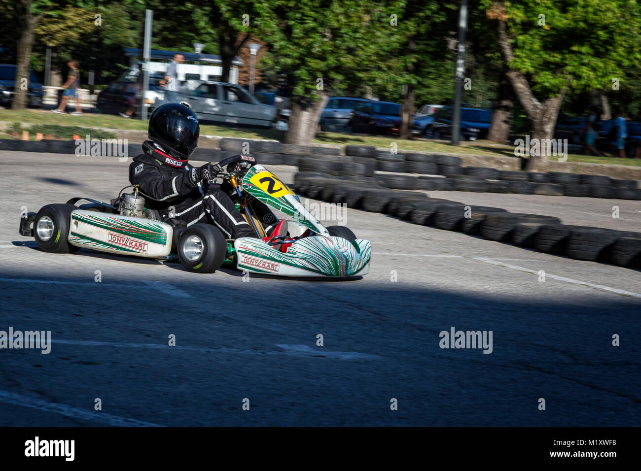 Driver in Go kart participate in outdoor kart race Stock Photo Alamy