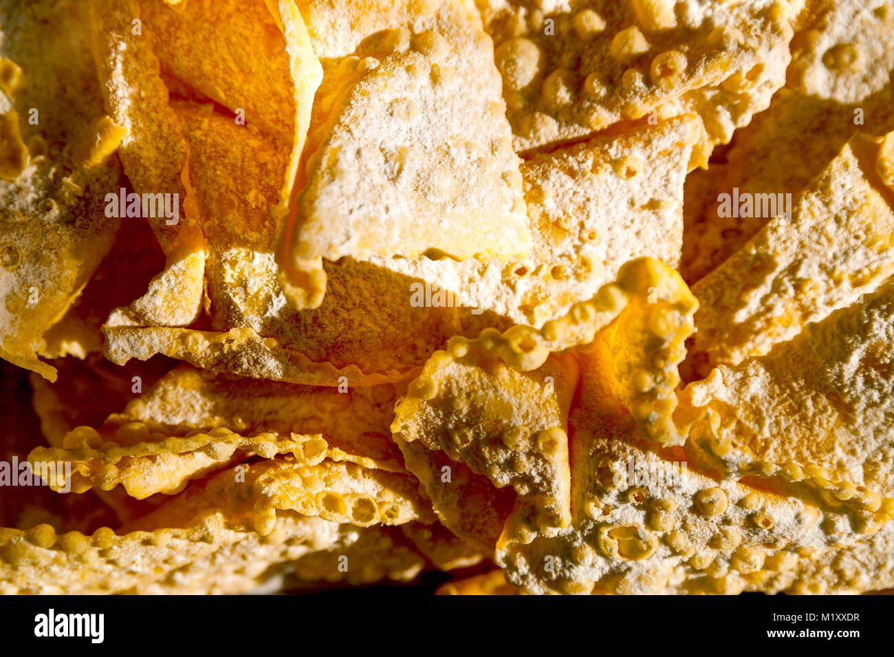 crostoli is a typical italian baked fried sweet eaten during carnival season Stock Photo