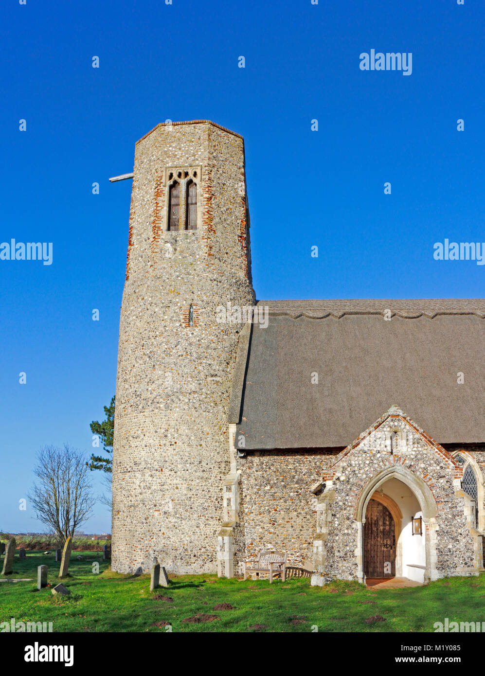 A view of the tower and south porch of the church of All Saints at