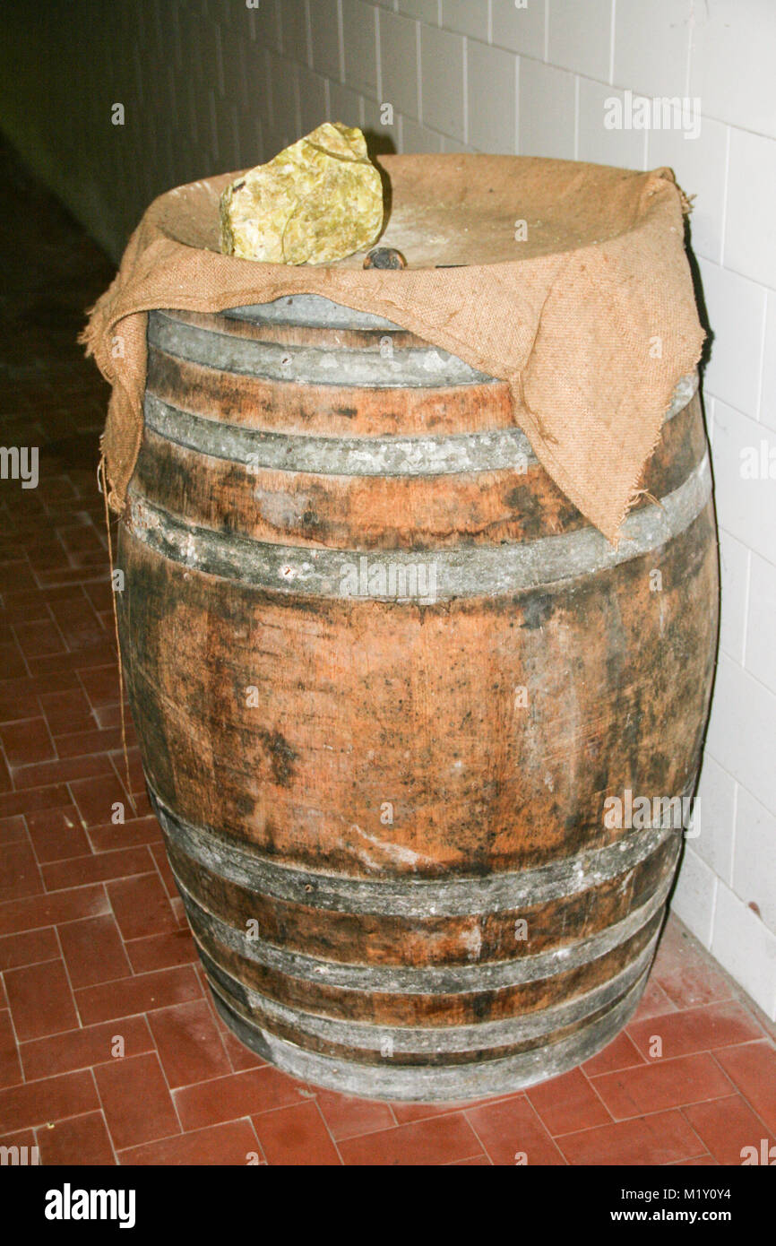 Sulfur rock on a barrel of wine Stock Photo Alamy