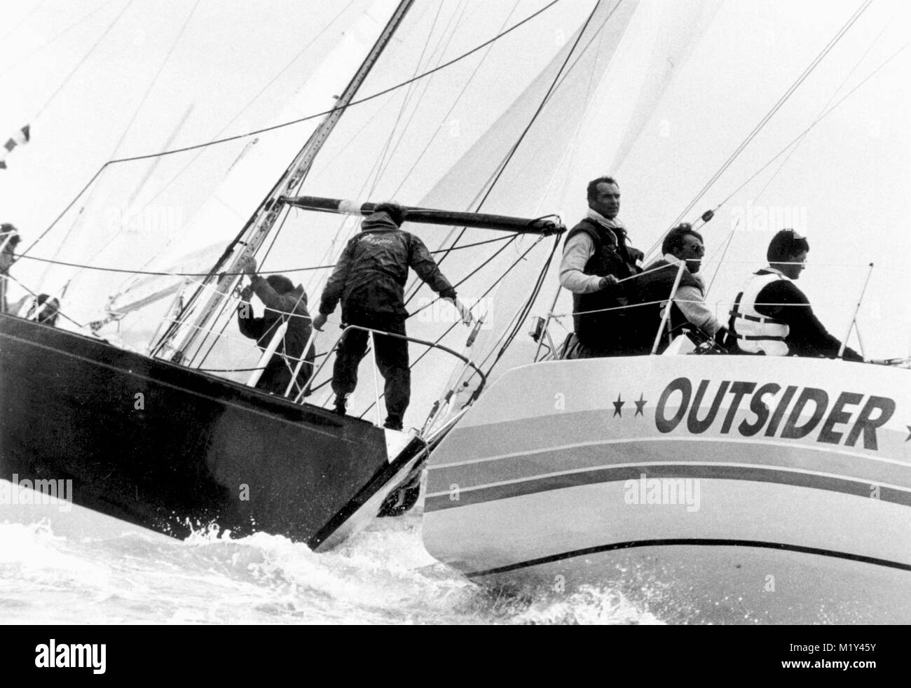 AJAXNETPHOTO. AUGUST 1983. COWES, ENGLAND. - ADMIRAL'S CUP, RACE 4 (3RD INSHORE) - GERMAN ENTRY OUTSIDER (T.HANSEN) SQUEEZES AHEAD OF THE FRENCH ENTRY PASSION (J.L.FOBRY) AS THEY APPROACH THE WEATHER MARK.  PHOTO:JONATHAN EASTLAND/AJAX REF:ARCPR 1983 Stock Photo