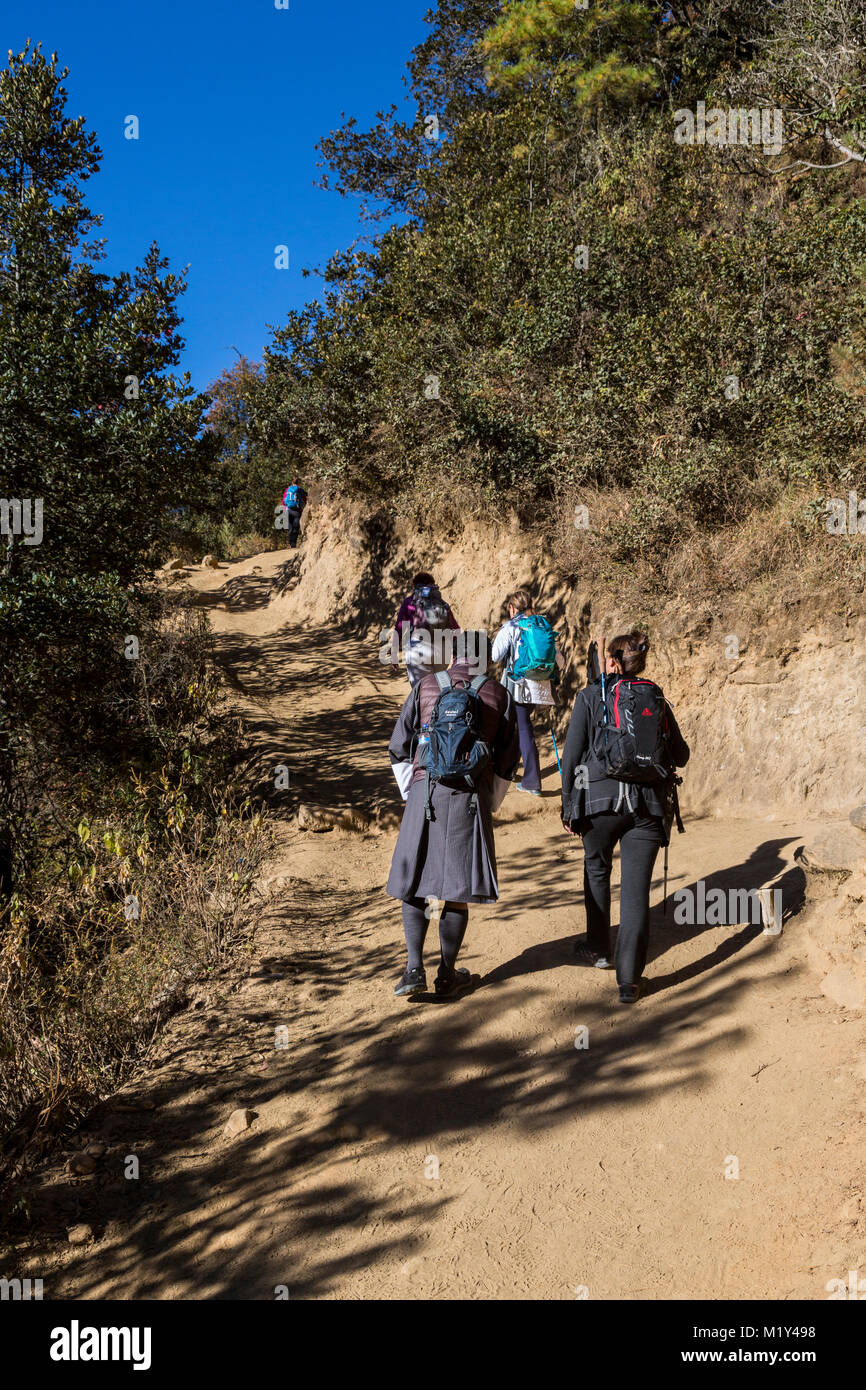 Paro, Bhutan.  Hikers on Trail to Tiger's Nest Monastery. Stock Photo