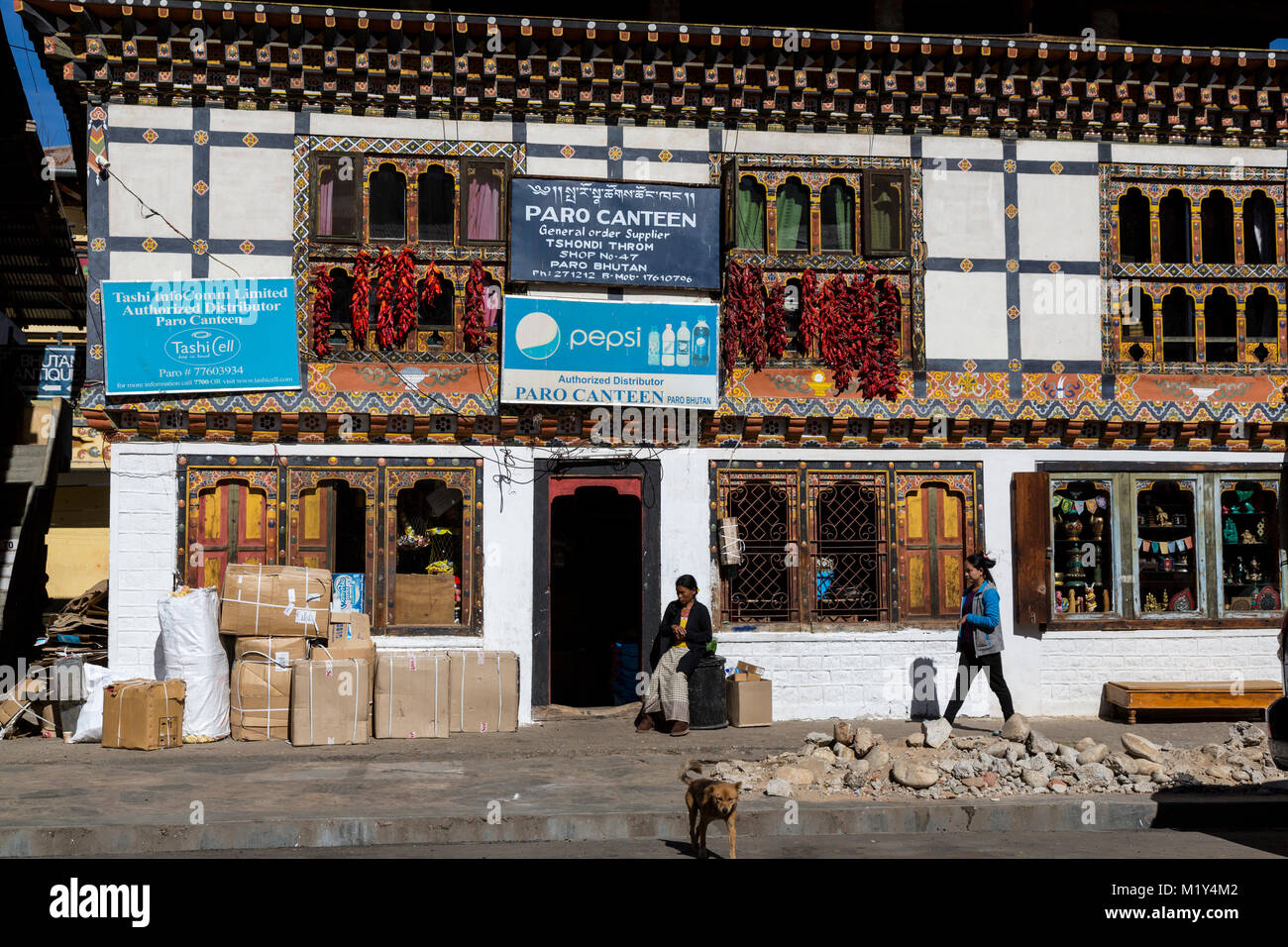 Paro, Bhutan.  Store on Paro's Main Street.  Chili Peppers Drying. Stock Photo