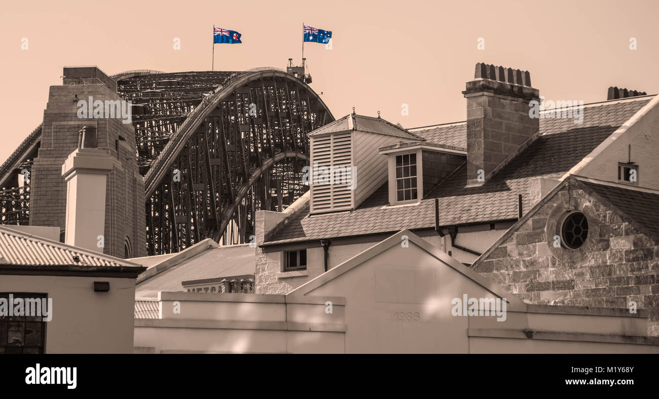 Sydney Harbour Bridge and Australian flags in sepia Stock Photo