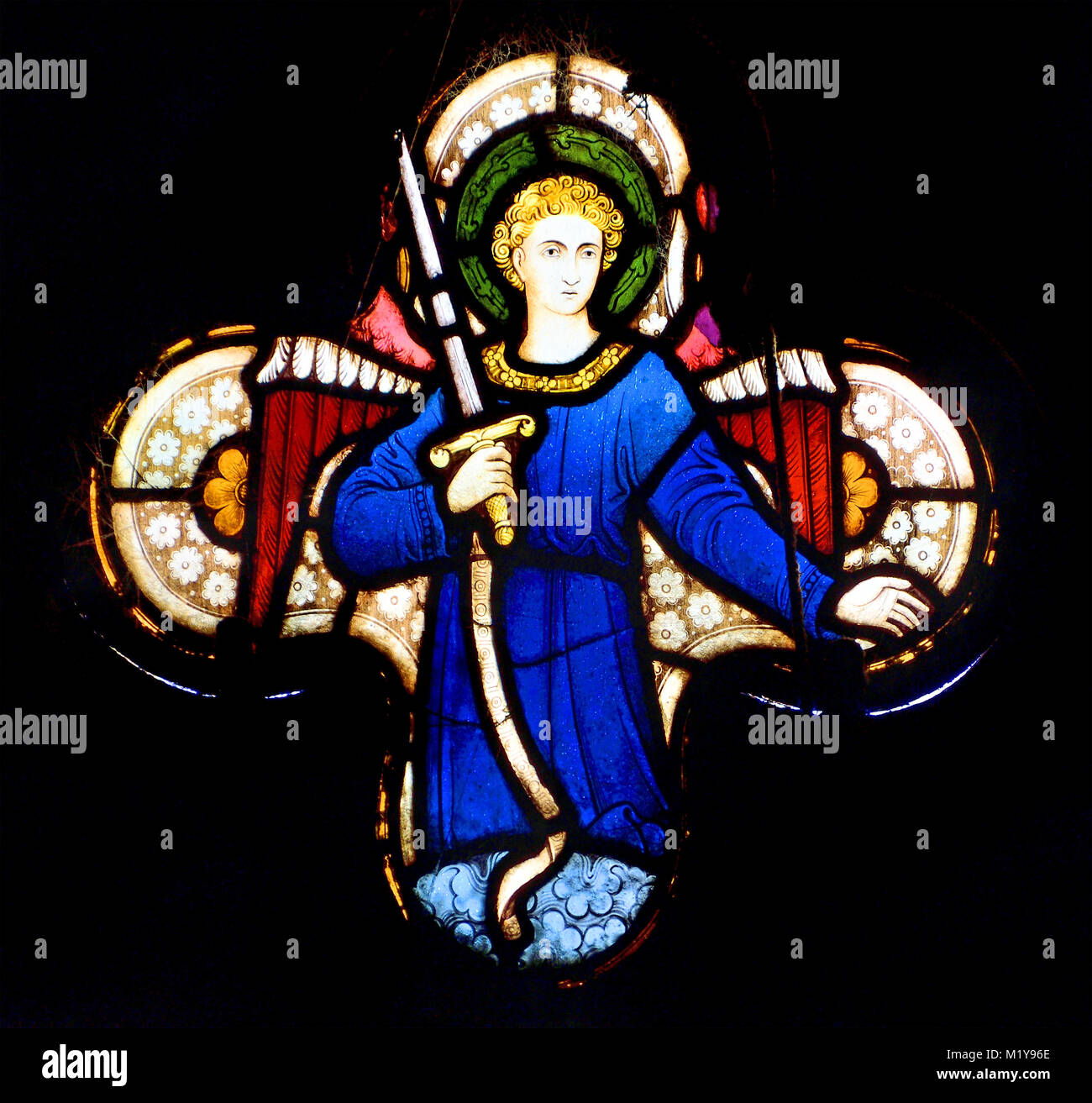 London, England, UK. St Mary Abbots parish church, Kensington. Stained glass window: Archangel Michael Stock Photo