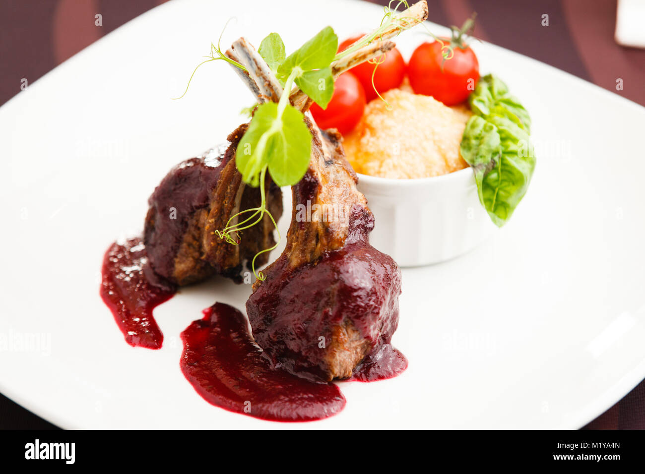 Grilled lamb with cranberry sauce Stock Photo Alamy