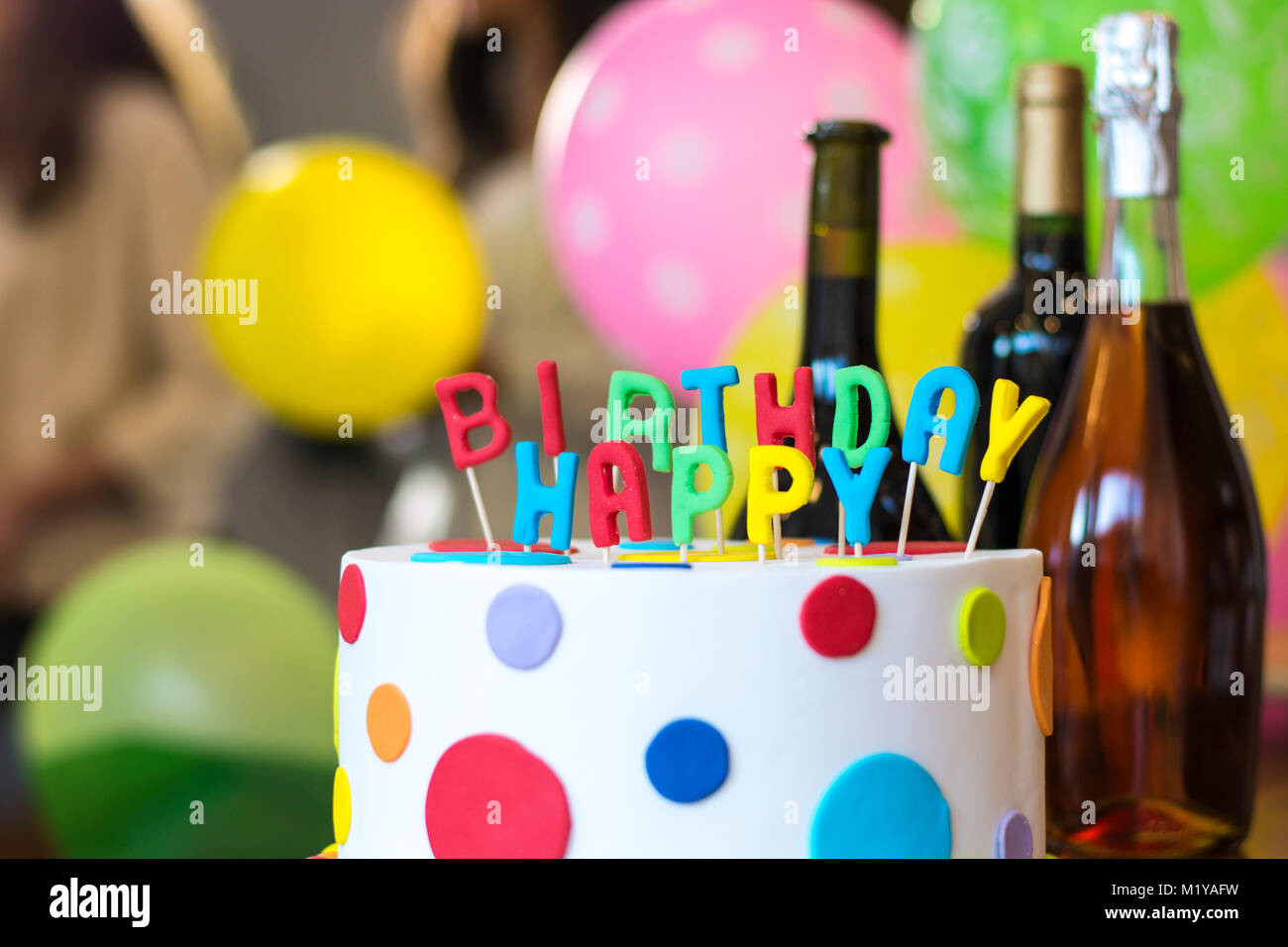Birthday Cake With Bottle Of Champagne Stock Photo Alamy