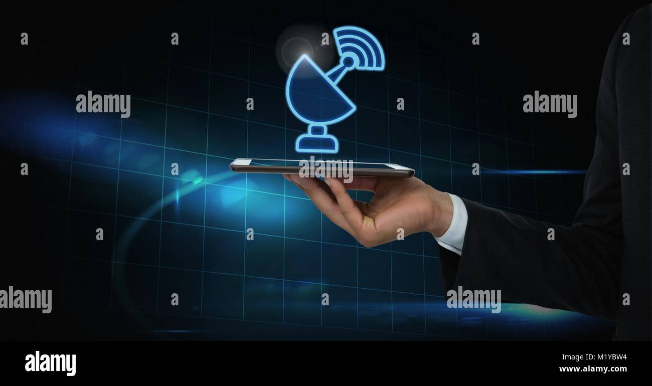 Hand holding tablet with signal icon Stock Photo