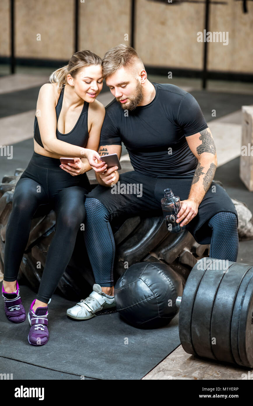 Fitness Youple Workout - Fit Mann and Woman Train in Gym Stock Photo -  Image of exercise, lifestyle: 65001120