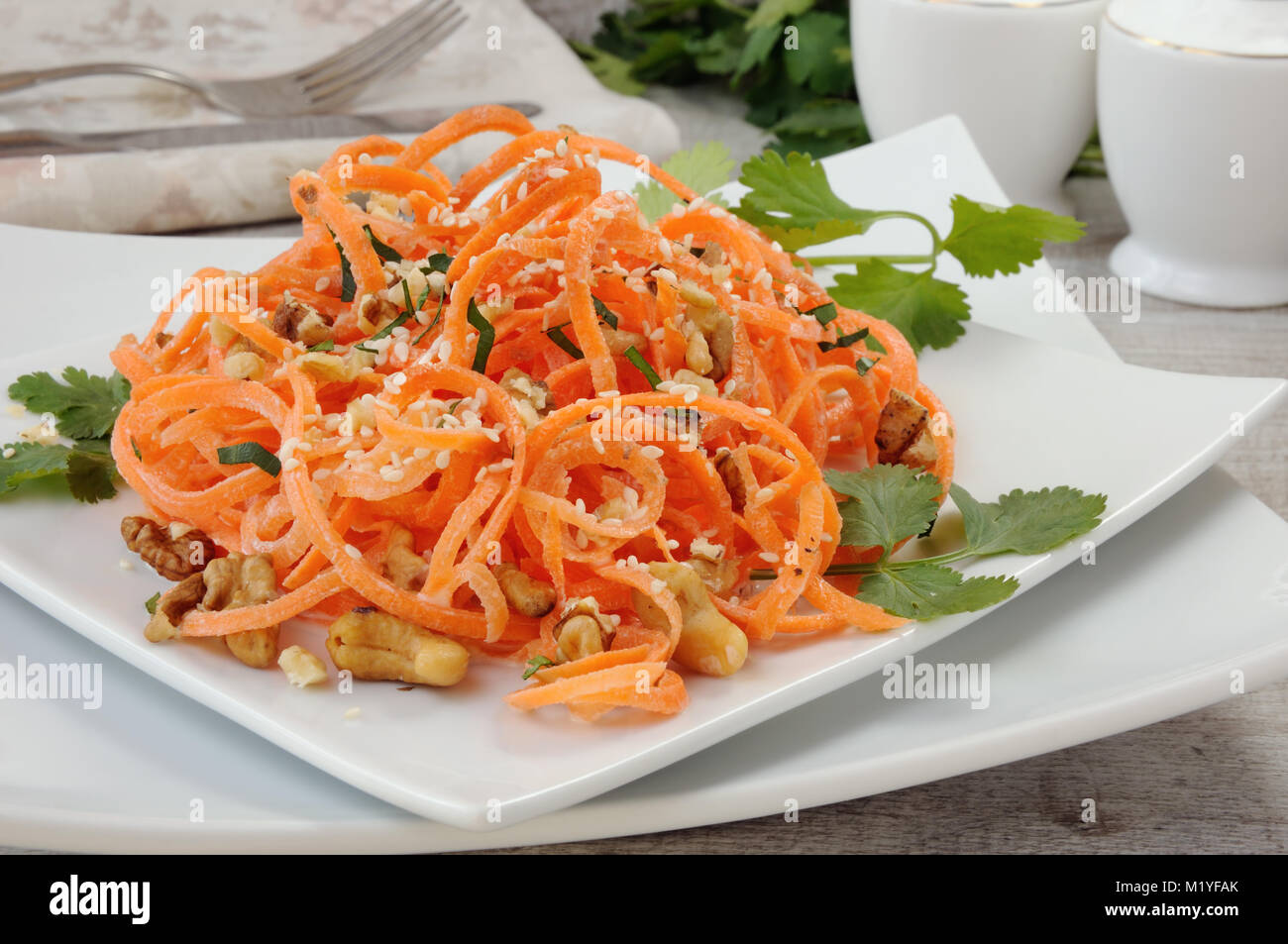 Carrot ribbon salad bathed with yoghurt dressing seasoned with fried