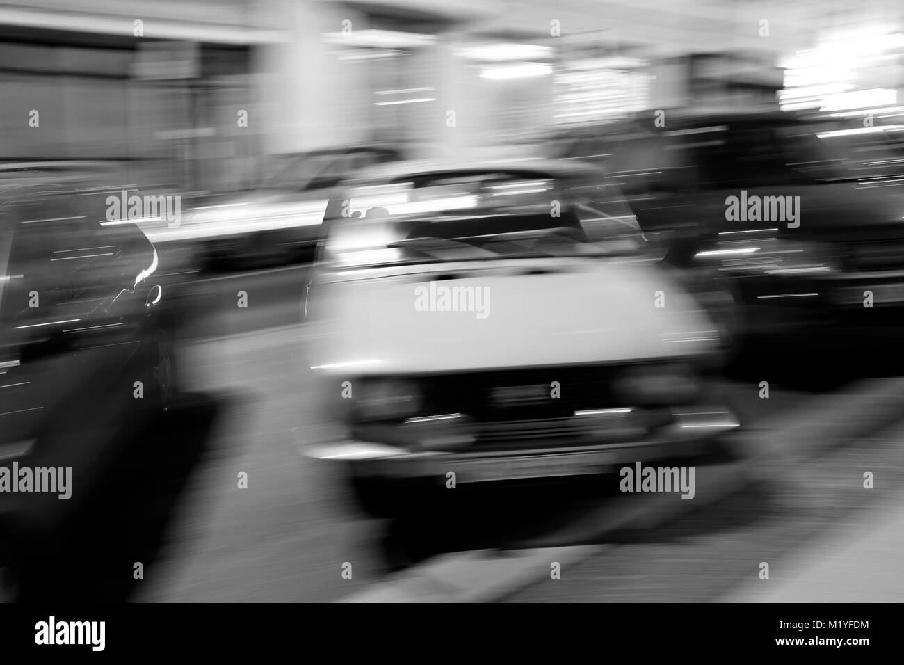 A long time exposure picture shows a car parking on a street at night in Prague, Czech Republic Stock Photo