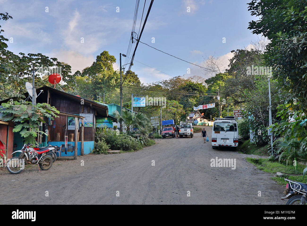 Main street in the remote jungle village of Drake Bay on the Osa Peninsula in Southern Costa Rica. Stock Photo
