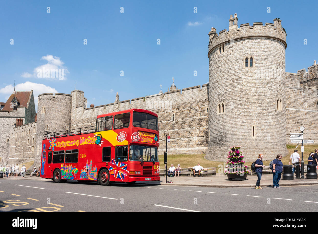 City Sightseeing open-top, double-decker sightseeing tour bus outside Windsor Castle, Windsor, Berkshire, England, GB, UK Stock Photo