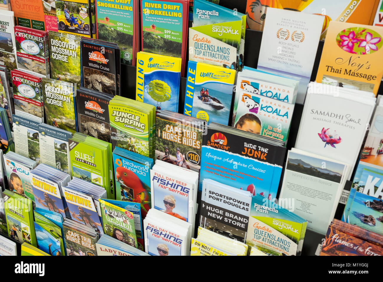 Tourism brochures and flyers promoting holiday activities around Port Douglas and Mossman gorge,Far north queensland,Australia Stock Photo