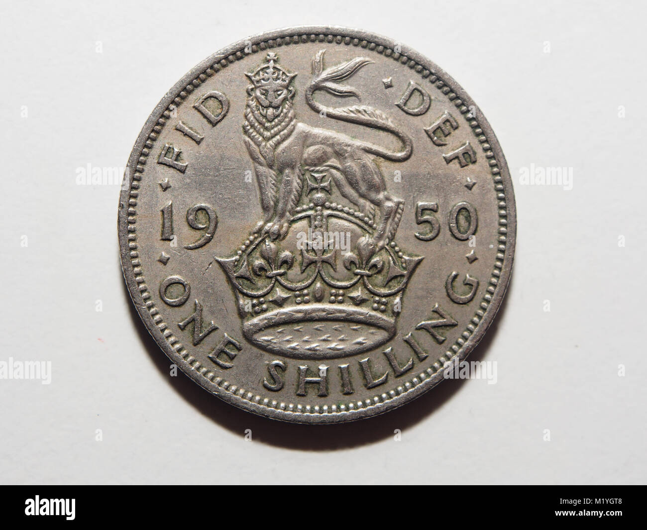 A 1950 one shilling coin from the UK Stock Photo Alamy