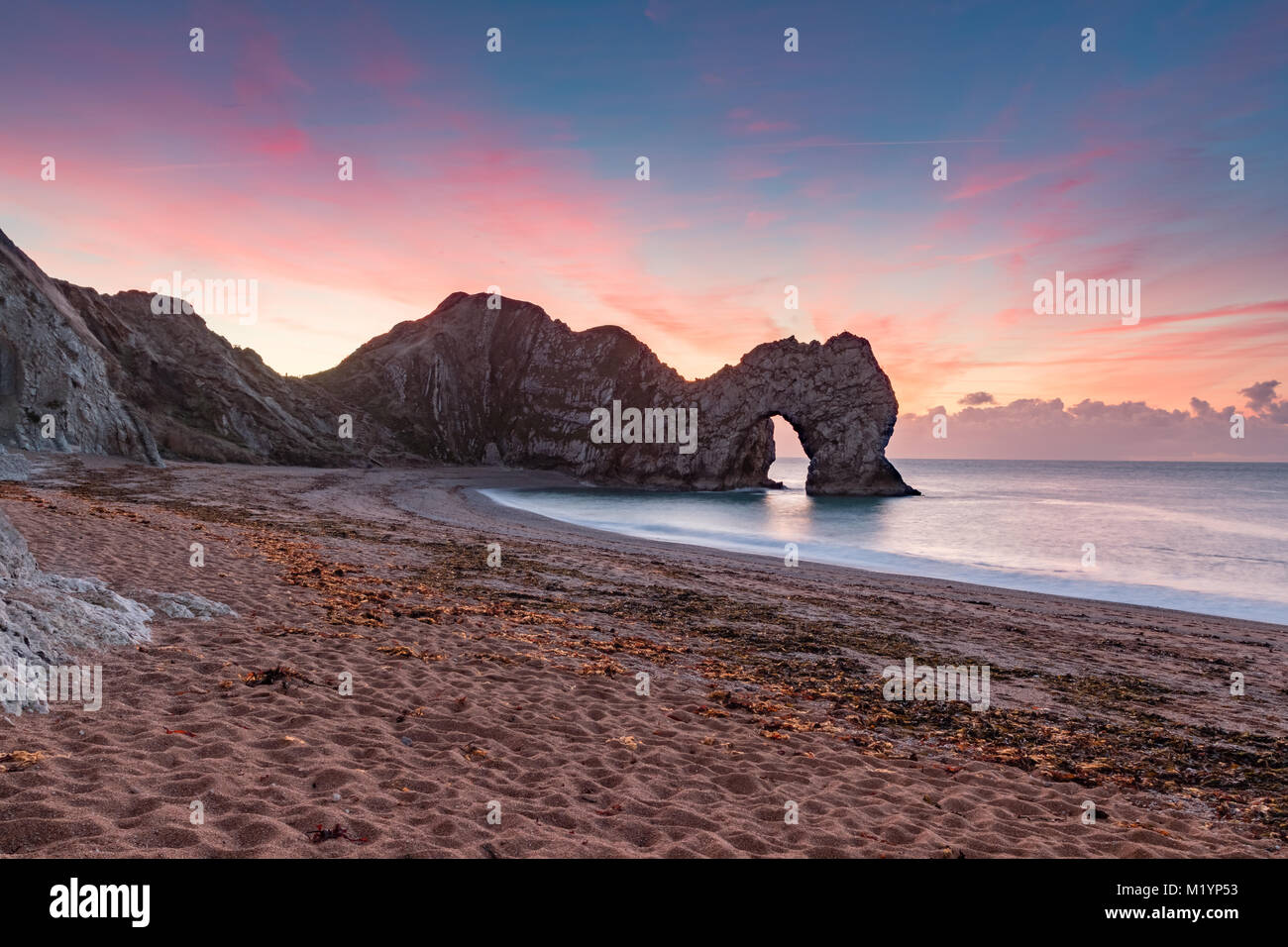 Durdle Door Sunrise Stock Photo Alamy