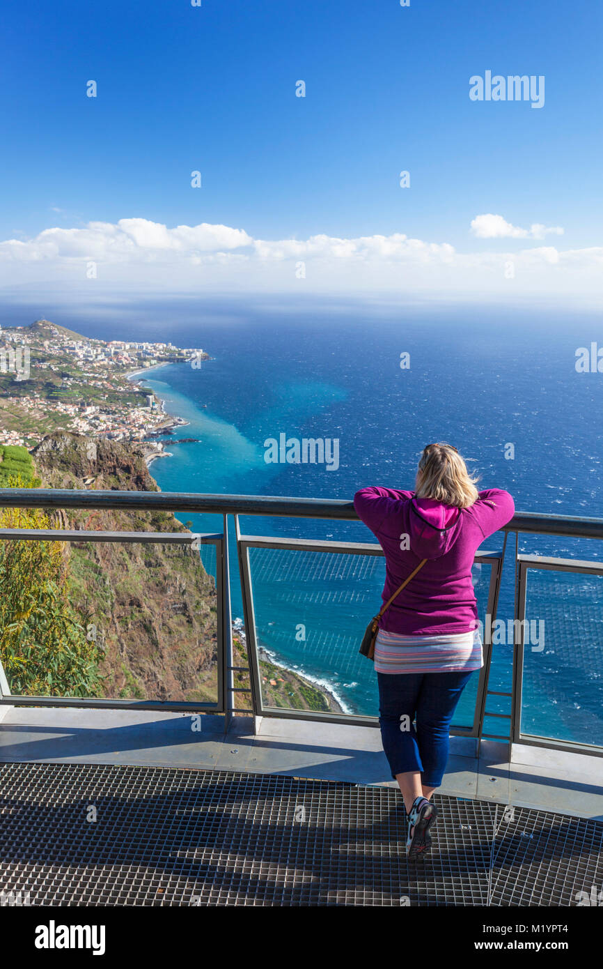 Cabo girao madeira portugal madeira Tourist on glass viewing platform at Cabo Girao skywalk a high sea cliff south coast  island of Madeira Portugal Stock Photo