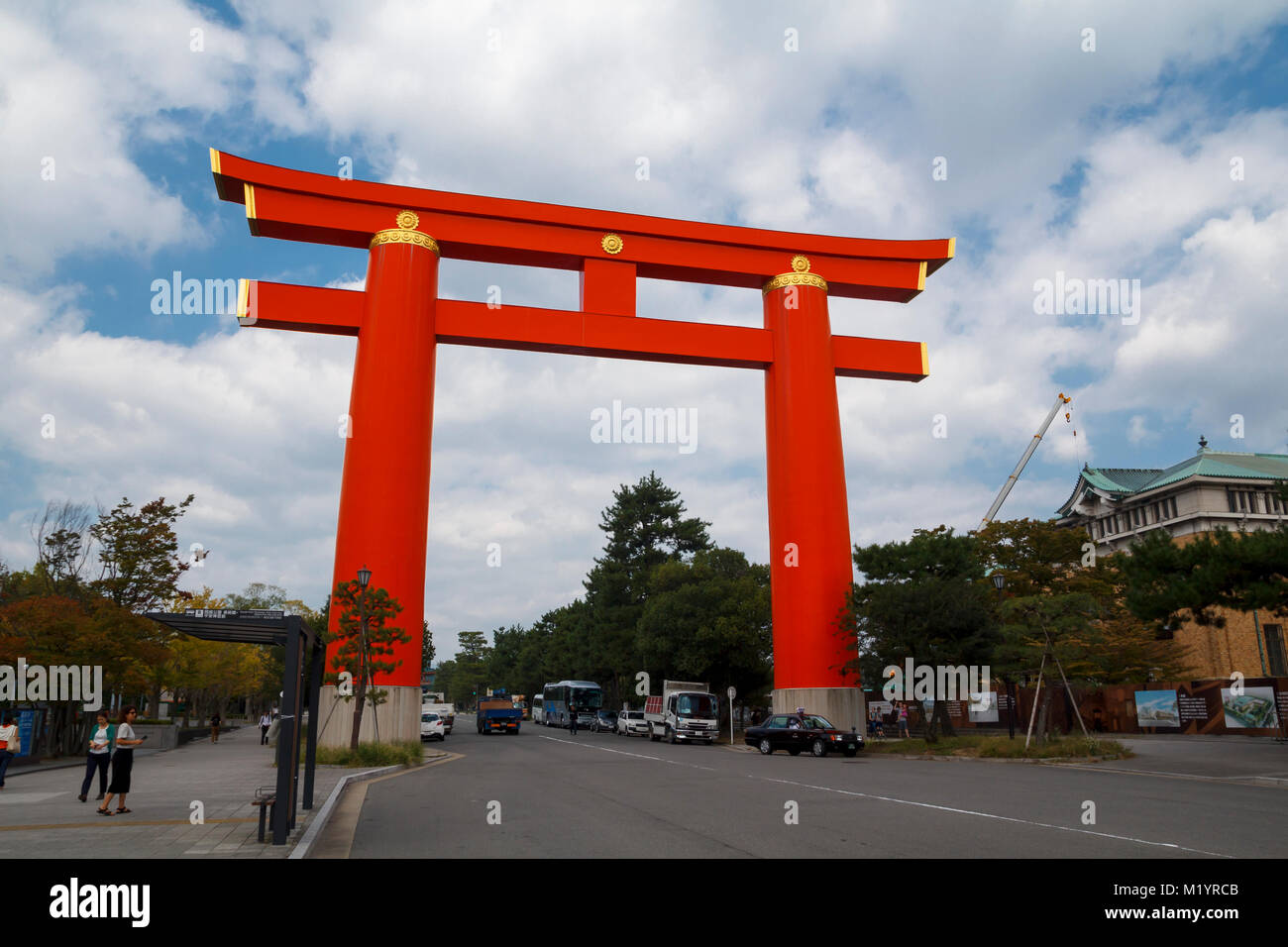Red torii gate in the entrance of Heian shrine in Kyoto, one of the biggest toriis in Japan Stock Photo