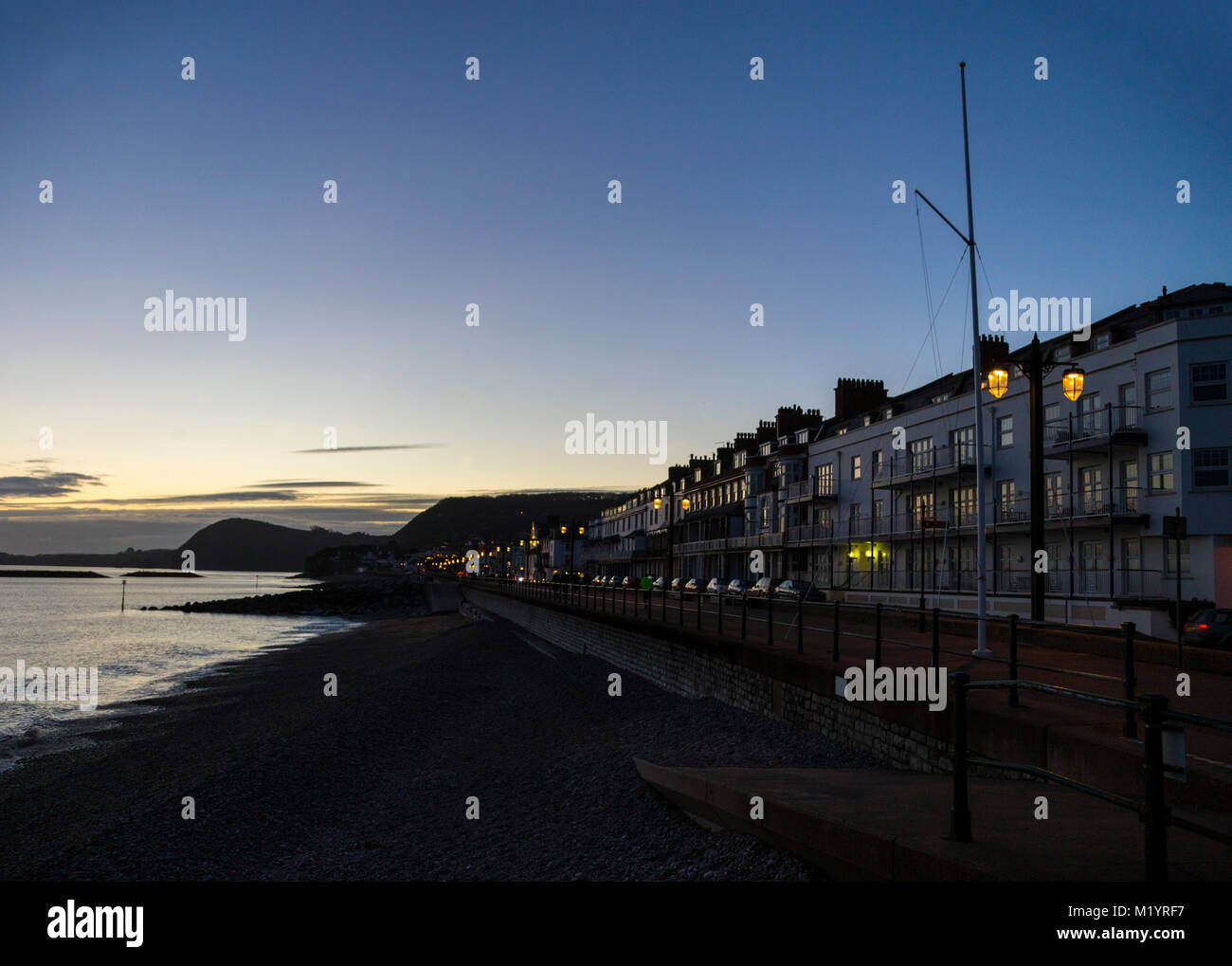 Night draws in on the seafront Esplanade at Sidmouth, Devon, England, UK. Stock Photo