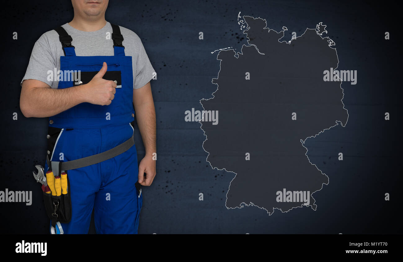 Germany map and craftsman with thumbs up. Stock Photo
