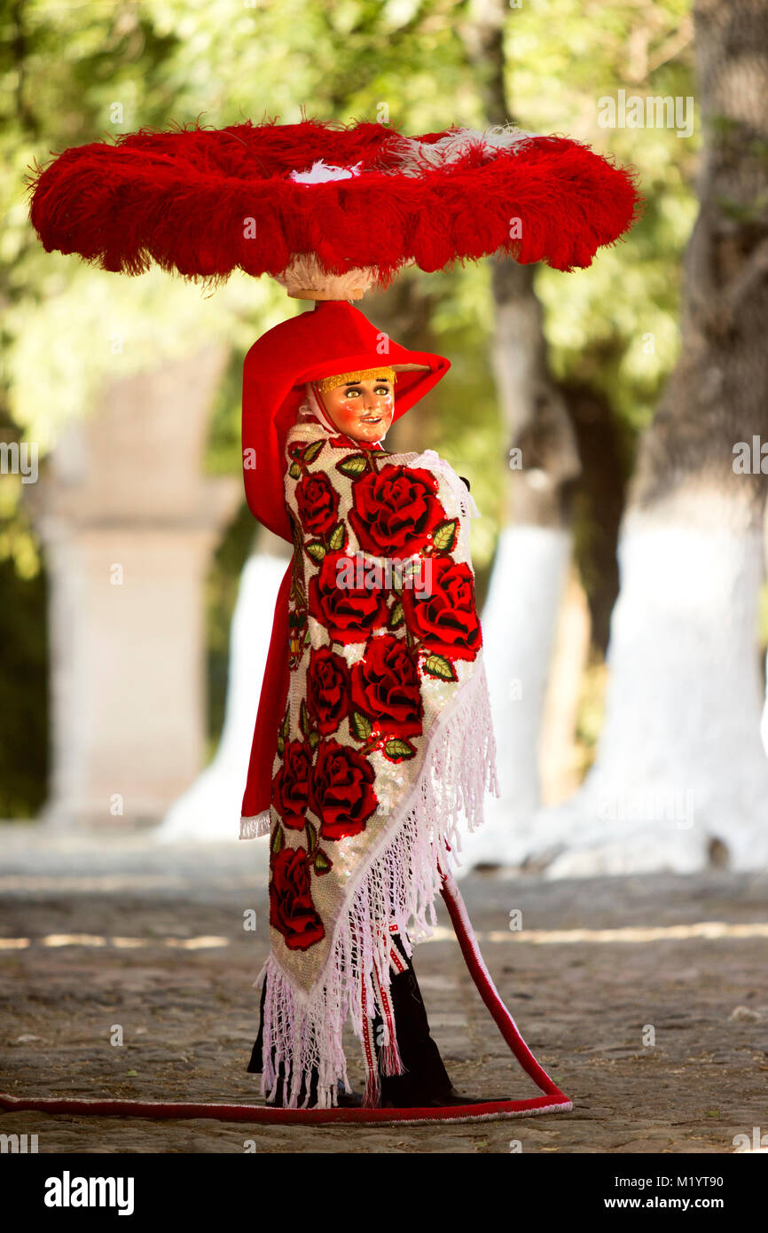 A Carnival dancer wearing a traditional mexican folk costume rich in color Stock Photo