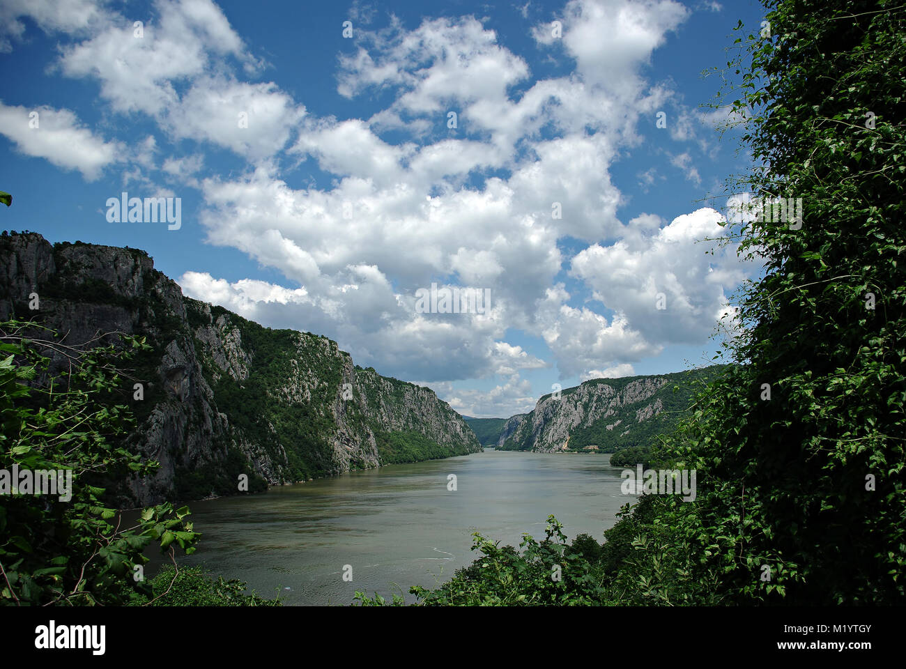 The Iron Gates is a gorge on the Danube River. It forms part of the boundary between Serbia and Romania. The broader Donji Milanovac forms the connect Stock Photo