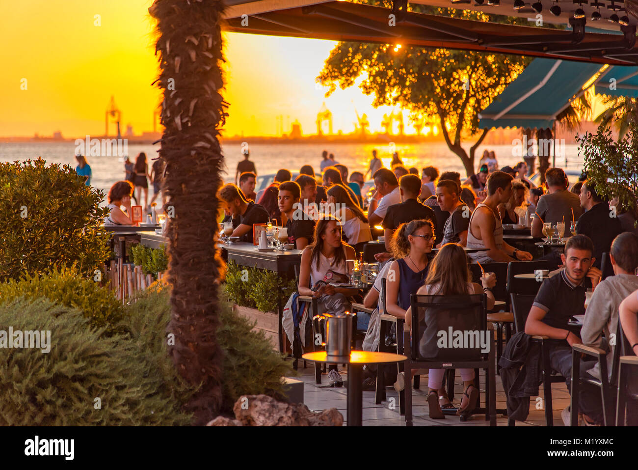 Thessaloniki coffee shop at sunset Stock Photo