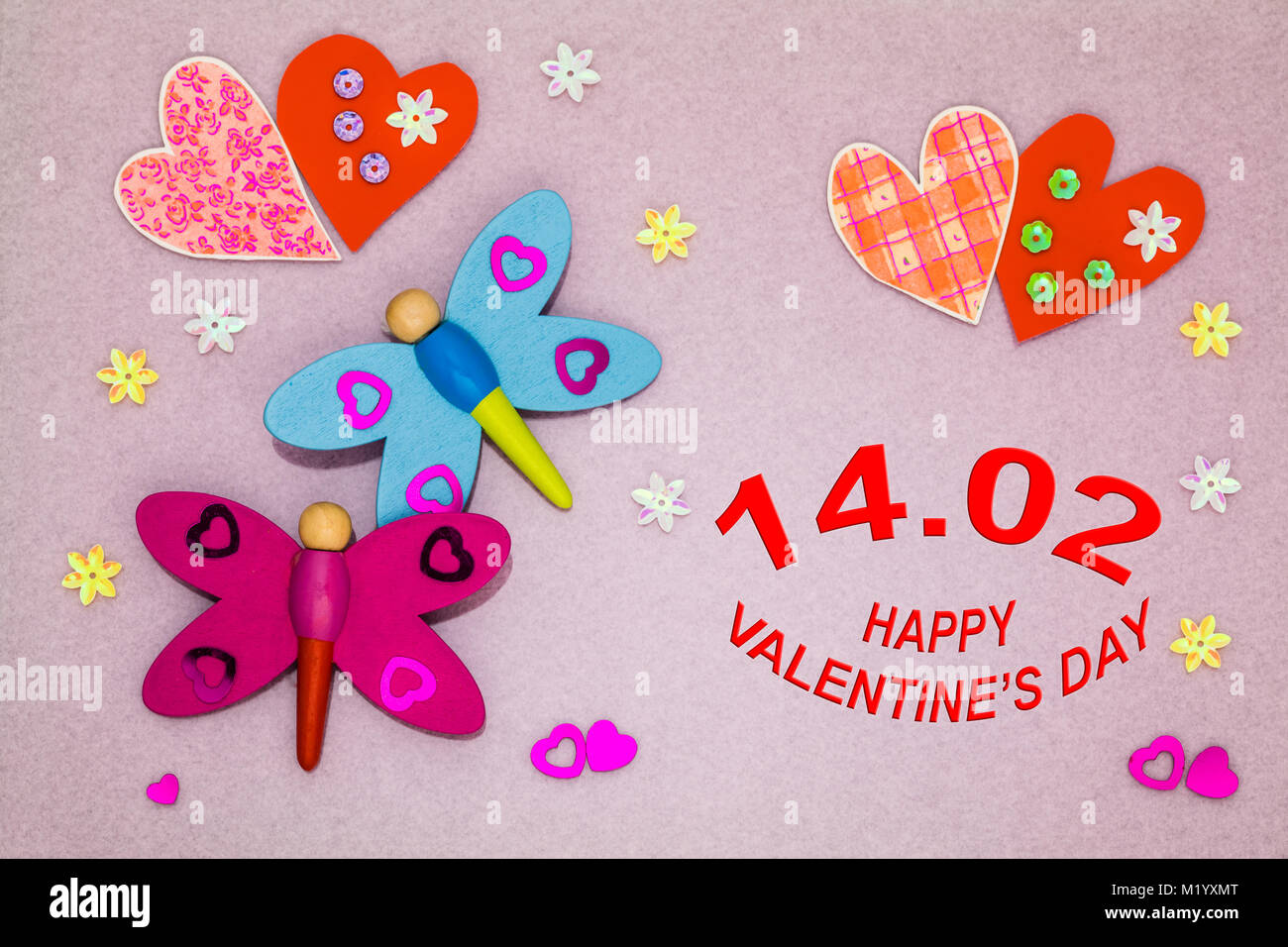 Valentines day card with hearts and dragonflies on colored background Stock Photo