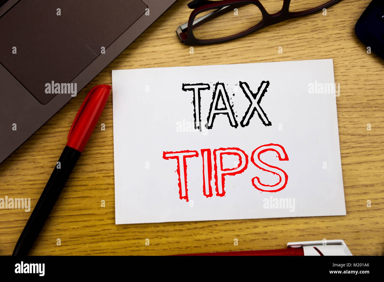 Handwriting Announcement text showing Tax Tips. Business concept for