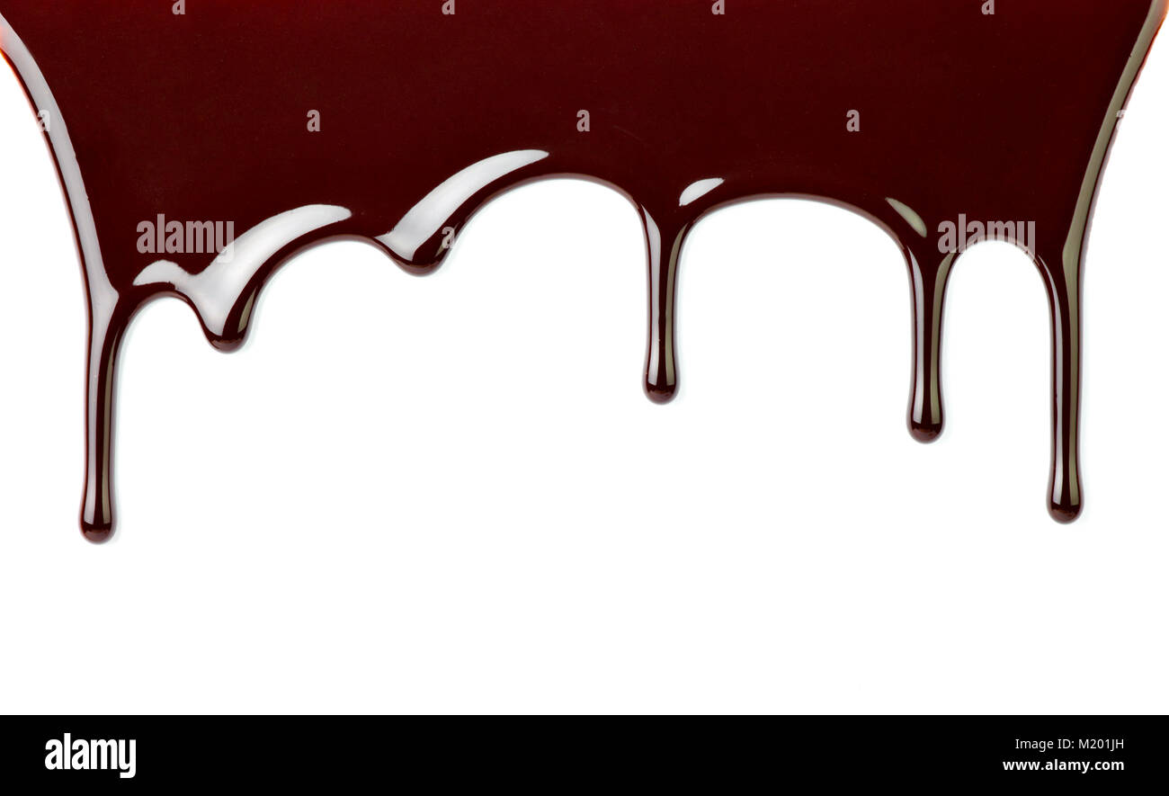 close up of chocolate syrup leaking on white background Stock Photo