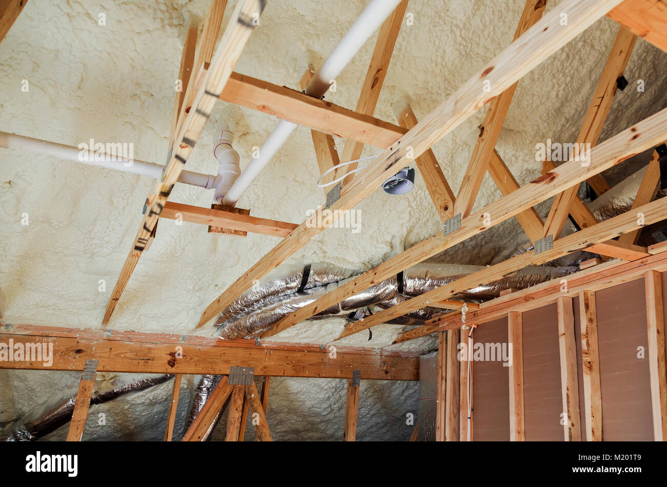 Insulation Of Attic With Fiberglass Cold Barrier And