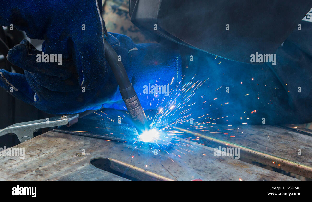 U.S. Marine Lance Cpl. Alante Pierce, a metal worker with 7th Engineer ...
