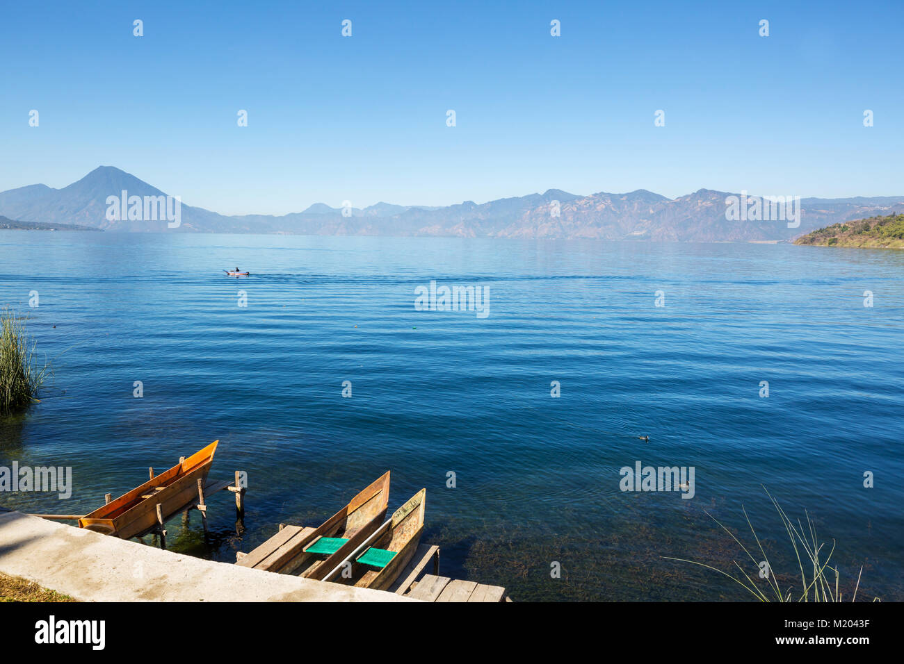 Beautiful lake Atitlan and volcanos in the highlands of Guatemala ...