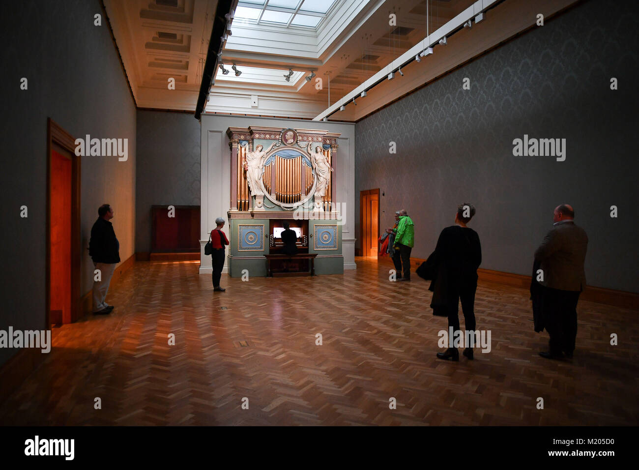 An organist performs &Ograve;Il Cielo In Una Stanza&Oacute; (The Sky in a Room) on the 1774 Sir Watkins Williams Wynn organ in the National Museum Wales&Otilde; 18th century British art gallery as part of an exhibition by artist Ragnar Kjartansson, titled 'The Sky in a Room', which sees a series of revolving organists constantly play across a five-week period, for five hours a day running from 3 February to 11 March. Stock Photo