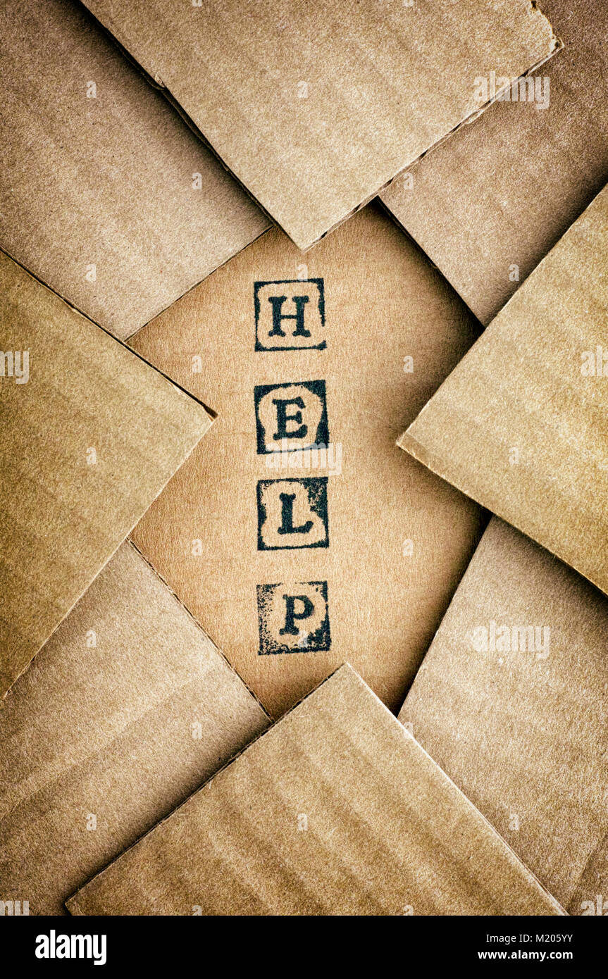 Cardboard letters made by alphabet stamps spelled out on cardboard  backgrounds Stock Photo - Alamy