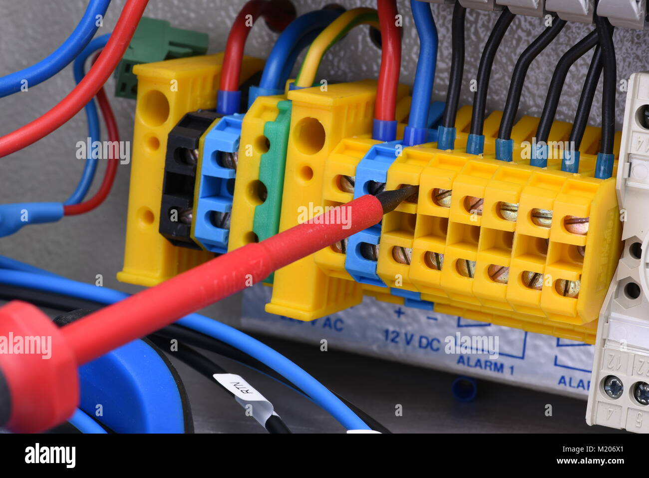 Electrical panel and tool in switchgear cabinet close-up Stock Photo