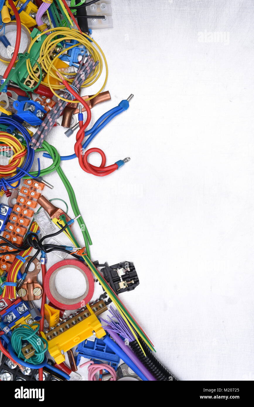 Components and accessories for use in electrical installations on metal