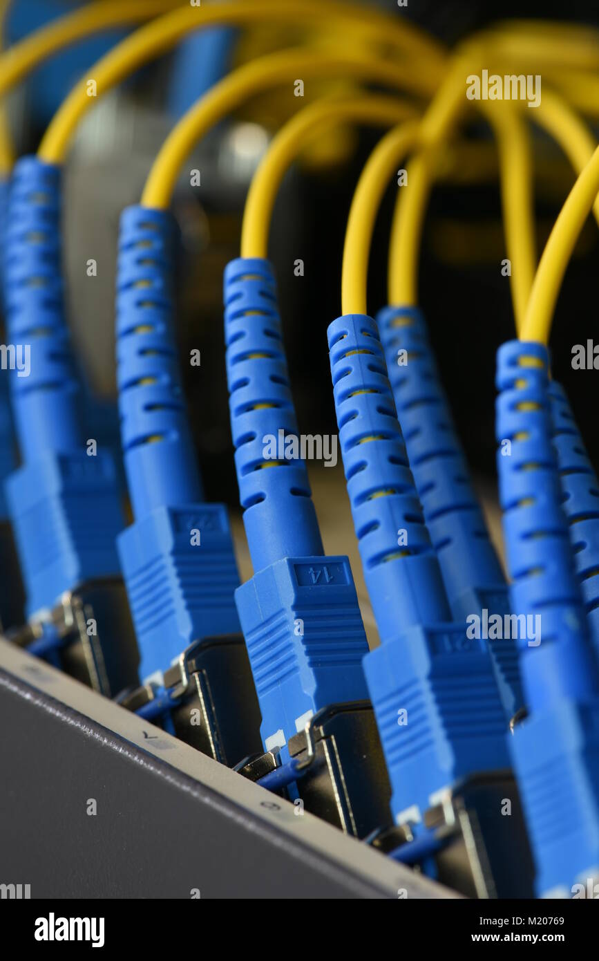 Fiber optic cables in data center Stock Photo