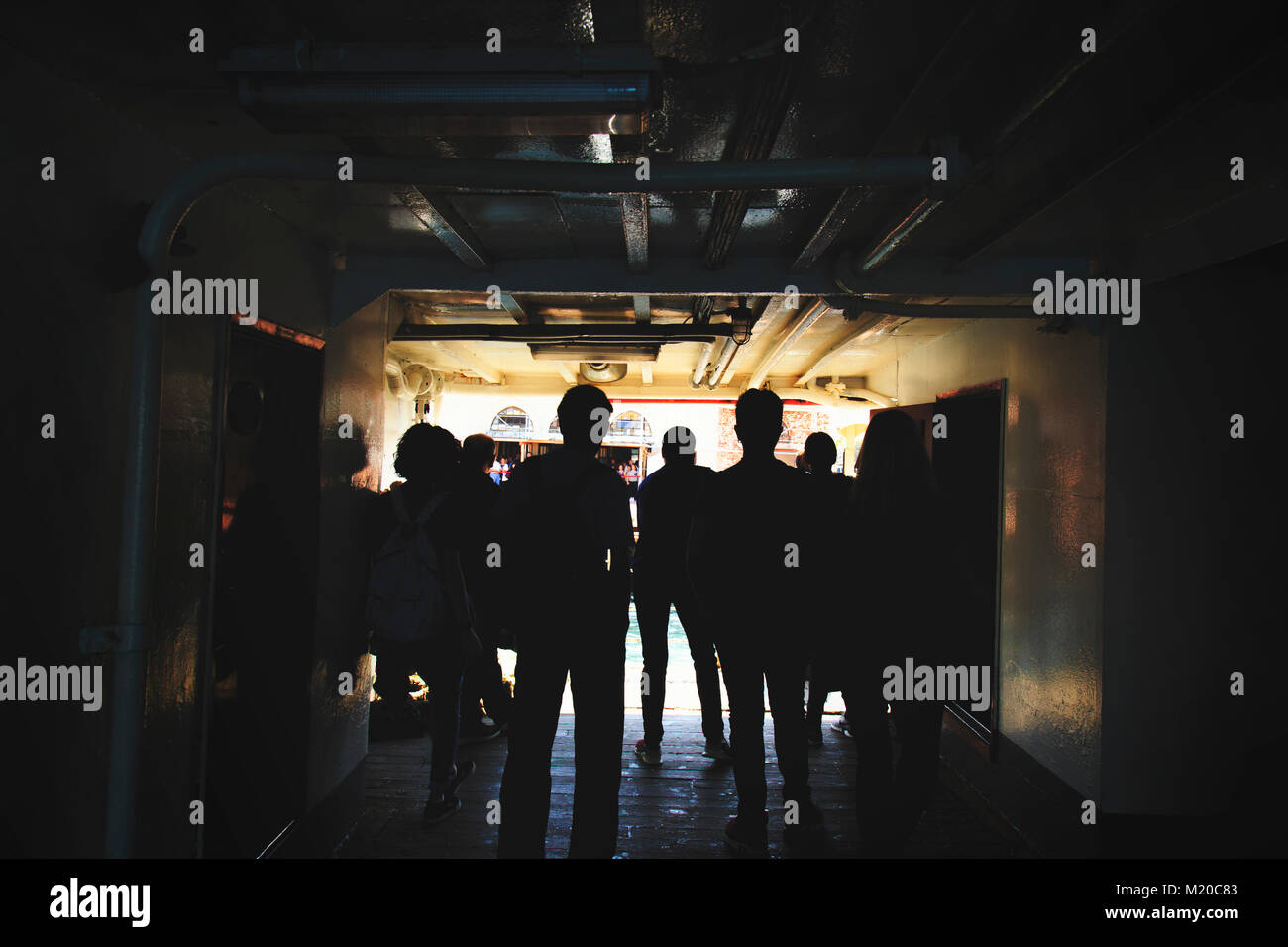 Silhouette of anonymous people waiting for deboard from the ship Stock ...