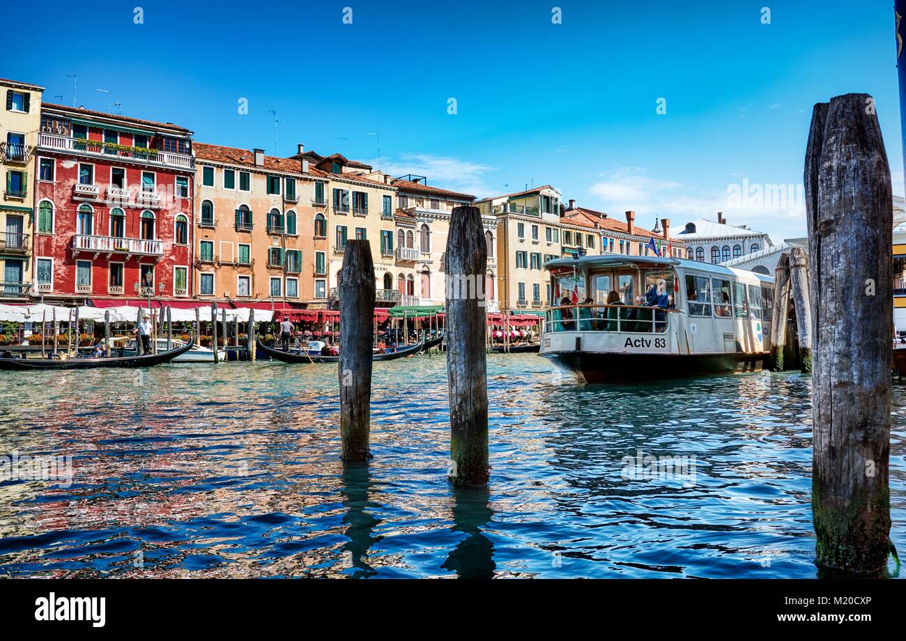 VENICE, ITALY - MAY 21, 2017: Beautiful view of old buildings, gondolas and vaporetto at the Grand Canal in Venice, Italy, taken from a gondola. Stock Photo