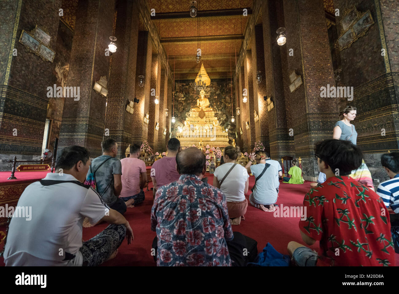 Golden Buddha statues in Wat Pho temple ion Bangkok, Thailand Stock ...