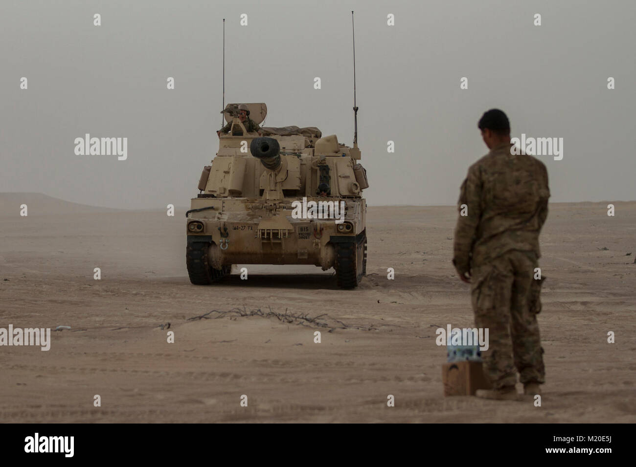 An M109 Paladin crew from 4th Battalion, 27th Field Artillery Regiment