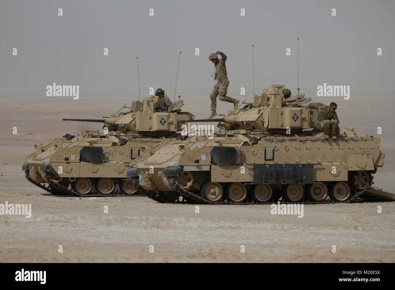 Two Bradley Fighting Vehicle crews from 1st Battalion, 37th Armored