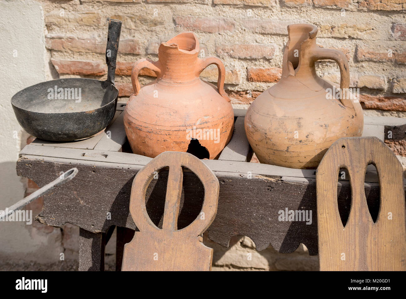 kitchen tools and utensils of medieval agriculture, ancient European farming instruments Stock Photo