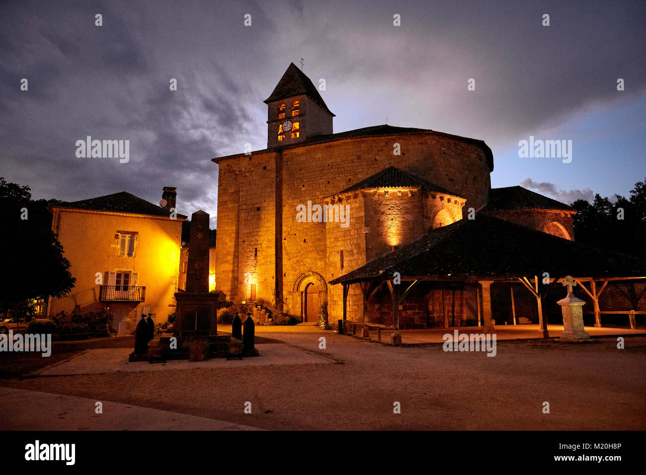 The church of Saint-Jean-Baptiste at dusk in St Jean de Cole in the Dordogne France - one of the most beautiful villages of France Stock Photo