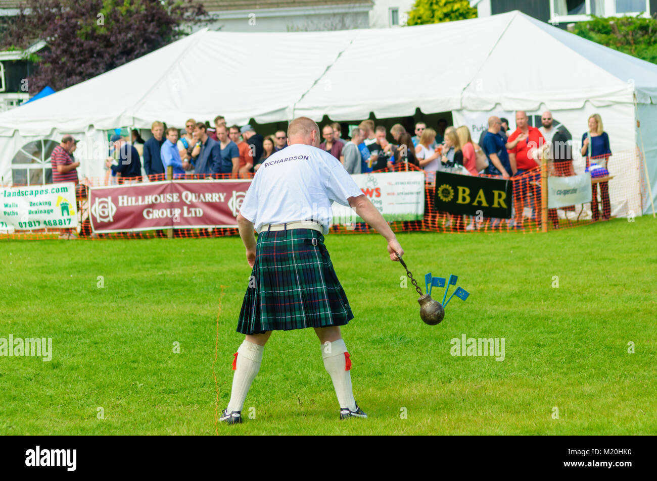 Throw Competition Male prepares to compete in the weight throw competition at the ...