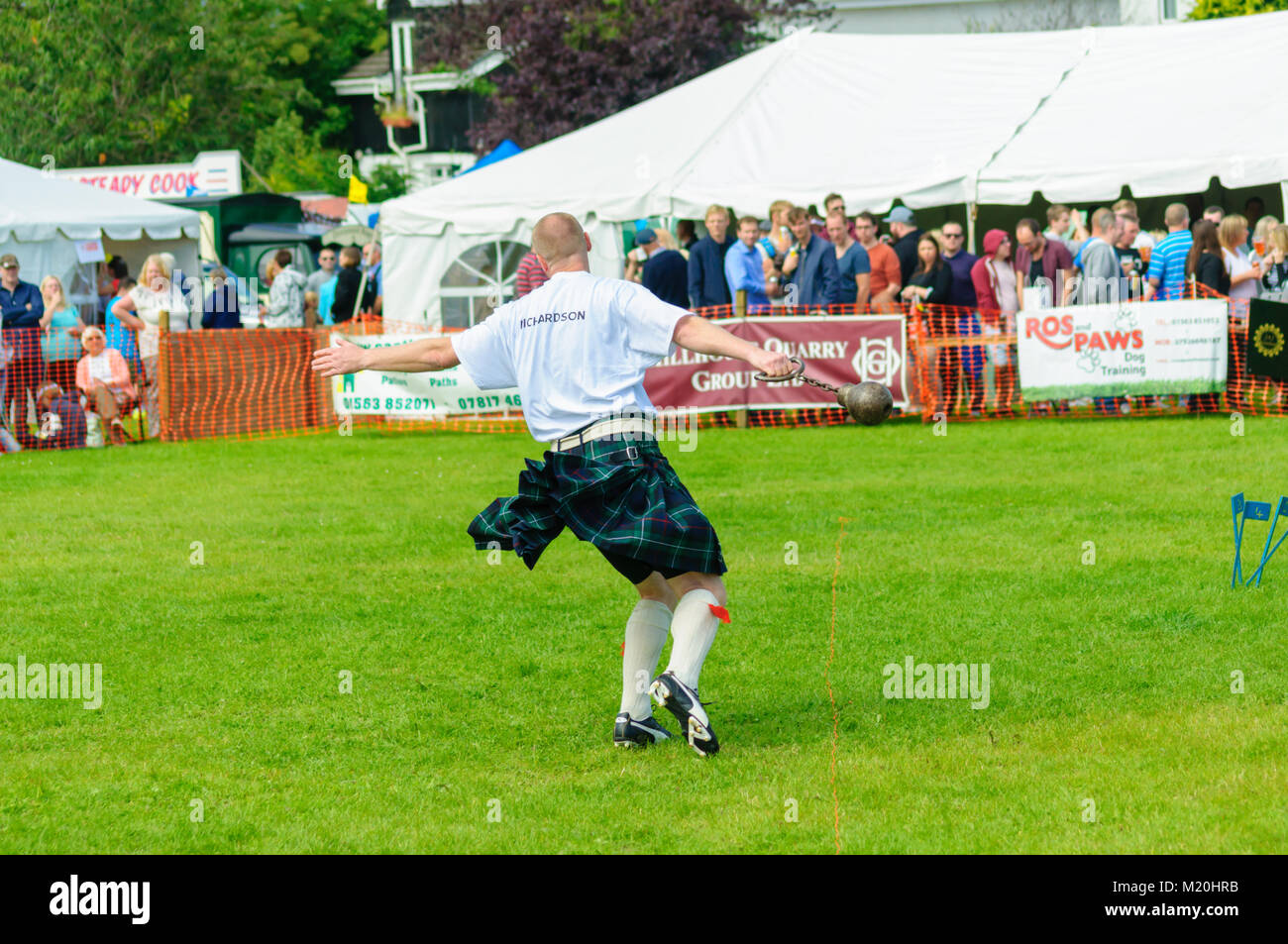 Male prepares to compete in the weight throw competition at the Dundonald Highland Games, Ayrshire, which celebrates traditional Scottish culture Stock Photo