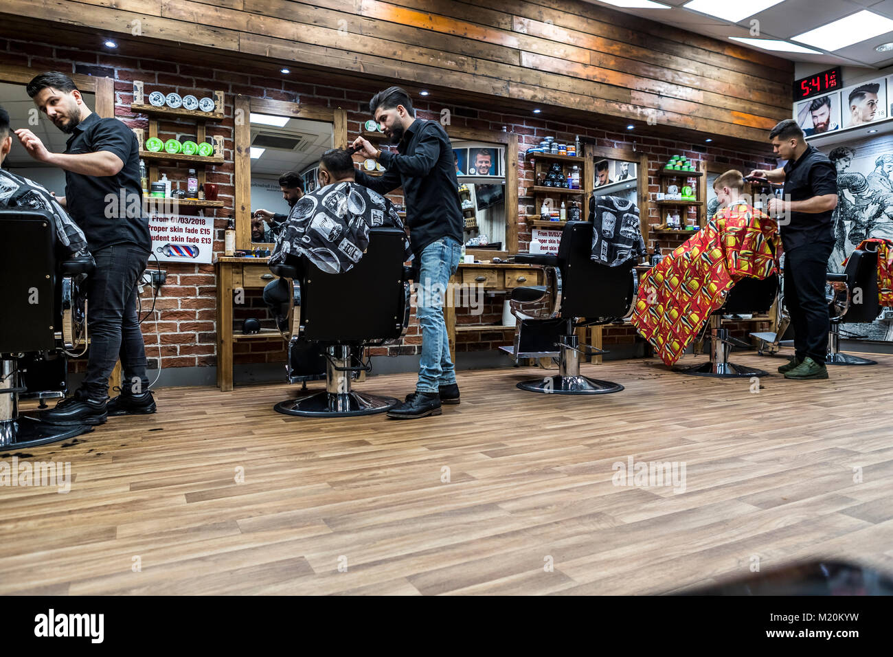 Mohsen's Barbers, Whiteladies Road, Bristol, UK. Trendy guys give